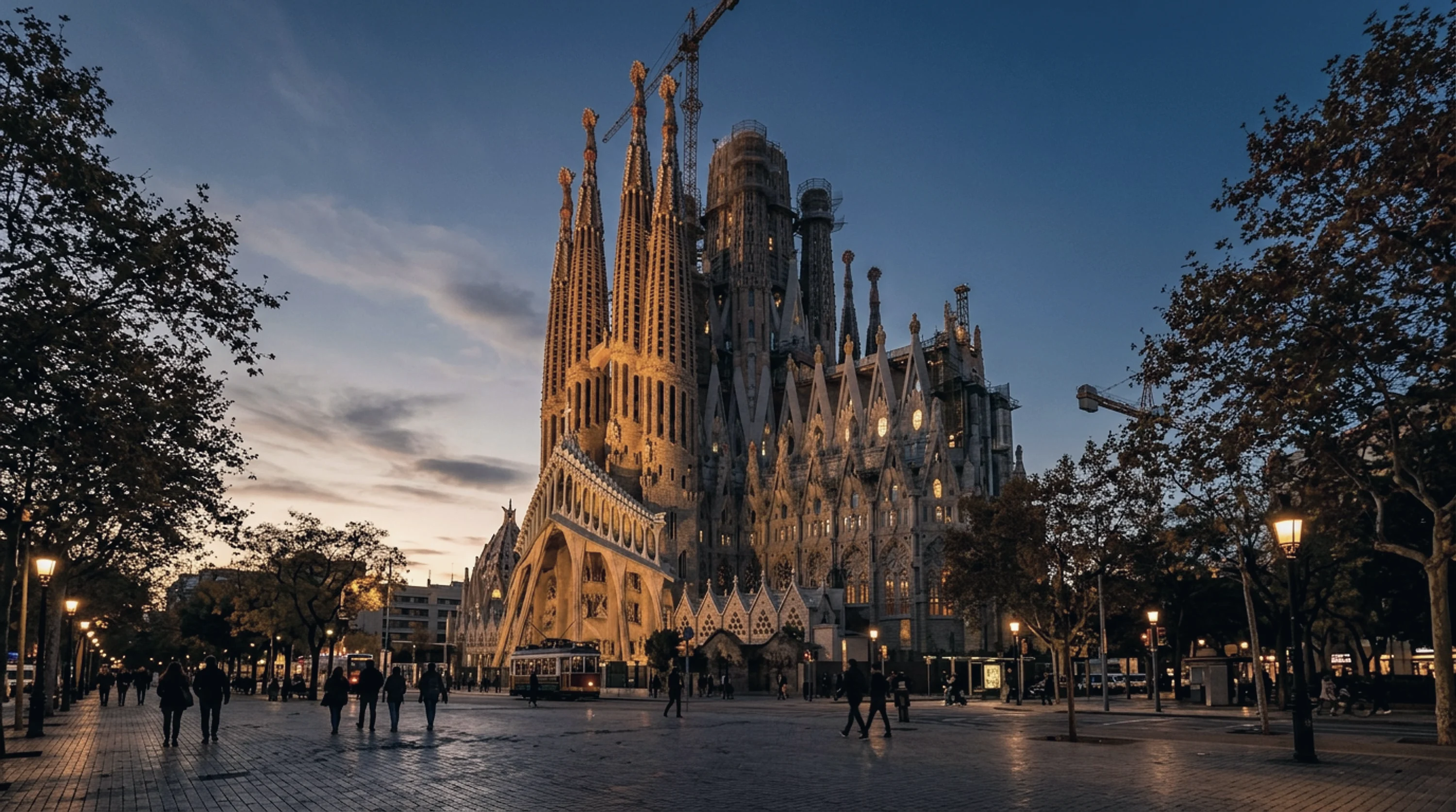 The Sagrada&nbsp;Família basilica glowing gold at dusk